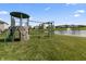 Plenty of room for to play in the yard with a pond view from home at 12959 Balfour Rd, Fishers, IN 46037