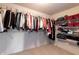 Spacious walk-in closet with plenty of storage space featuring metal racks and shelving at 12959 Balfour Rd, Fishers, IN 46037