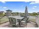 Relax on this deck and enjoy the weather with views of the community and pond at 12959 Balfour Rd, Fishers, IN 46037