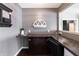 Small office space featuring a built-in desk, cabinets and neutral wall color for a comfortable workspace at 12959 Balfour Rd, Fishers, IN 46037
