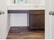 Bathroom vanity with stylish wood cabinets and light countertop at 13752 N George Ct, Camby, IN 46113