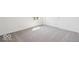 A naturally bright bedroom features neutral walls, carpet, and closet at 13752 N George Ct, Camby, IN 46113