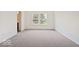 Bright bedroom with carpet floors, white walls, and natural light at 13752 N George Ct, Camby, IN 46113