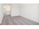 A naturally bright bedroom features neutral walls, carpet, and white trim at 13752 N George Ct, Camby, IN 46113