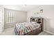 A delightful bedroom with a charming bed and colorful quilt at 1527 Canyon Oak Ln, Columbus, IN 47201