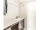 Convenient laundry area featuring a sink and counter space for folding at 1527 Canyon Oak Ln, Columbus, IN 47201