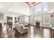 Spacious living room featuring tall ceilings, fireplace, and an open floor plan at 1527 Canyon Oak Ln, Columbus, IN 47201
