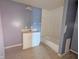 A full bathroom features a vanity sink, toilet, and tub with shower, ready for updates at 1546 S New Jersey St, Indianapolis, IN 46225