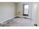 This empty bedroom offers natural light from a single window, awaiting personalization and decor at 1546 S New Jersey St, Indianapolis, IN 46225