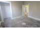 An empty bedroom is freshly painted and offers ample closet space at 1546 S New Jersey St, Indianapolis, IN 46225