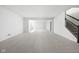 Spacious unfinished basement ready for customization, featuring carpet and staircase to the main level at 17354 Newton Main St, Westfield, IN 46074