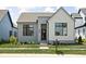 Charming single-story home with gray brick, white siding, black trim, and landscaped front yard at 17354 Newton Main St, Westfield, IN 46074