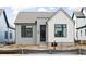 Charming home featuring a blend of brick and white siding, with a welcoming entrance and modern design at 17354 Newton Main St, Westfield, IN 46074