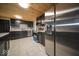 Modern kitchen featuring stainless steel appliances, stone countertops and dark cabinets at 1808 Raible Ave, Anderson, IN 46011