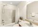 Well-lit bathroom with shower, sink, and decorative accents, creating a clean and functional space at 2183 Glebe St, Carmel, IN 46032