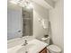 Clean bathroom featuring a vanity, toilet, and a glass-enclosed shower, offering a functional space at 2183 Glebe St, Carmel, IN 46032