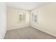 Bright bedroom with neutral walls, carpet, and shuttered windows offering natural light at 2183 Glebe St, Carmel, IN 46032