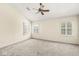 Spacious bedroom with neutral walls, carpet, and shuttered windows offering ample light at 2183 Glebe St, Carmel, IN 46032