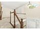 Bright two-story foyer with a large oval window and a view of the entry door below at 2183 Glebe St, Carmel, IN 46032