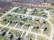Areal view of a residential neighborhood showing a pin over a home, surrounded by lawns and winding streets at 2314 Angelina Way, Greenwood, IN 46143