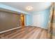 This is a large finished basement with wood floors, neutral colored paint, and a walk in closet at 2314 Angelina Way, Greenwood, IN 46143