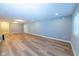 The finished basement features wood floors, recessed lighting, and plenty of space for storage and recreation at 2314 Angelina Way, Greenwood, IN 46143