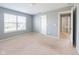 Bedroom with neutral carpet, window for natural light and easy access to the bathroom at 2314 Angelina Way, Greenwood, IN 46143