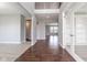 Spacious foyer with hardwood floors, high ceilings, and an open floor plan at 2314 Angelina Way, Greenwood, IN 46143