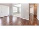 Inviting foyer featuring hardwood floors and an open floor plan at 2314 Angelina Way, Greenwood, IN 46143