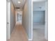 Upstairs hallway with neutral carpet leading to a bedroom with ample natural light at 2314 Angelina Way, Greenwood, IN 46143