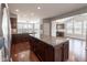 Bright, modern kitchen with a large island, granite countertops, and stainless appliances at 2314 Angelina Way, Greenwood, IN 46143