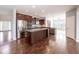 Gourmet kitchen with stainless steel appliances, granite countertops, and a large island at 2314 Angelina Way, Greenwood, IN 46143