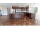 Spacious kitchen featuring granite countertops, stainless steel appliances, and dark wood cabinets at 2314 Angelina Way, Greenwood, IN 46143