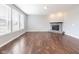 Spacious living room with a stone fireplace and an abundance of natural light at 2314 Angelina Way, Greenwood, IN 46143
