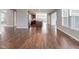 Open-concept living room featuring hardwood floors and abundant natural light at 2314 Angelina Way, Greenwood, IN 46143