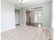 Inviting living room with tile floors, ample lighting, and a stylish chandelier at 2314 Angelina Way, Greenwood, IN 46143