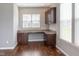 Dedicated work area with desk and storage cabinets near natural light source at 2314 Angelina Way, Greenwood, IN 46143