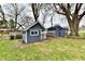 Backyard view showcasing two sheds that offer extra storage space, in a great backyard setting at 2315 Cardinal Dr, Indianapolis, IN 46227