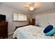 Relaxing bedroom with a comfy bed, large closet, and natural light from the large window at 2315 Cardinal Dr, Indianapolis, IN 46227