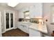 Bright kitchen featuring white cabinets, ample counter space, and modern appliances at 2315 Cardinal Dr, Indianapolis, IN 46227