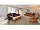 Bright living room with carpet and comfortable seating at 2315 Cardinal Dr, Indianapolis, IN 46227