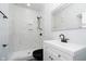 Bathroom features a white vanity with a black faucet and a tile shower at 238 N Tacoma Ave, Indianapolis, IN 46201