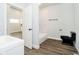 This bathroom features modern floors, a bathtub with marble-style surround, and black fixtures at 238 N Tacoma Ave, Indianapolis, IN 46201