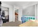 Bedroom with a closet and view of the stairway at 3051 Arrow Wood Ln, Indianapolis, IN 46214