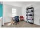 Bedroom features a desk, a closet, a shelving unit and two chairs at 3051 Arrow Wood Ln, Indianapolis, IN 46214