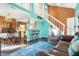 Open-concept design seamlessly integrates the living room, kitchen, and dining area, perfect for modern living at 3051 Arrow Wood Ln, Indianapolis, IN 46214