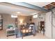 Finished basement with comfortable seating, decorative rugs, and painted block walls at 311 S Webster Ave, Indianapolis, IN 46219