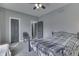 Bedroom with ceiling fan, carpet and 2 doors at 3357 Saddle Club Rd, Greenwood, IN 46143
