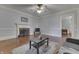 Spacious living room with fireplace, crown molding, and hardwood floors at 3357 Saddle Club Rd, Greenwood, IN 46143