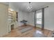 Bright room with built-ins, hardwood floors, and a chandelier at 3357 Saddle Club Rd, Greenwood, IN 46143